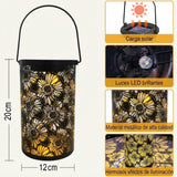 Farol solar calado con proyección floral · Fotografía del proveedor 7