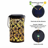 Farol solar calado con proyección floral · Fotografía del proveedor 8