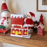 Papá Noel Subiendo la Chimenea